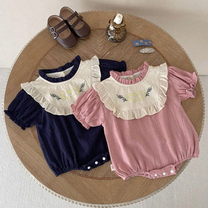 -ベビー フラワー 刺繍 フリルビブ 半袖 ロンパース ピンク ネイビー ガールズ【mh0002042】 - mamahalo shop - 半袖ロンパース -  べビー服 - 子供服 - 男の子 - 女の子