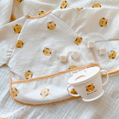 お食事エプロン tiger / S(6-18M) ベビー 長袖 お食事エプロン ビブ スタイ ポケットスタイ 離乳食 りす タイガー 虎 恐竜 くま うさぎ【mh0001449】